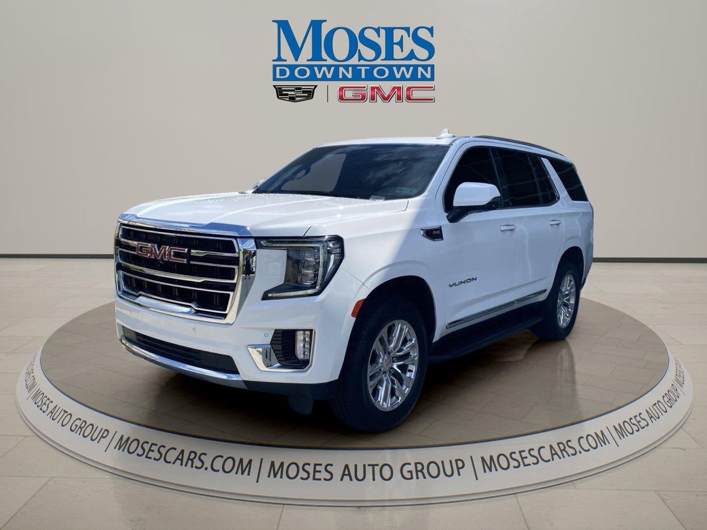 2022 GMC Yukon SLT in Summit White — front three-quarter view